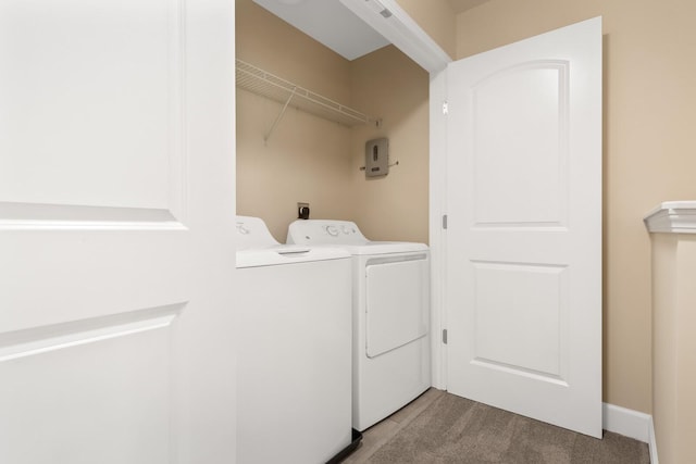 clothes washing area with washing machine and dryer and carpet floors