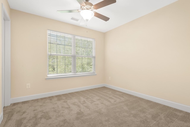 carpeted empty room with ceiling fan