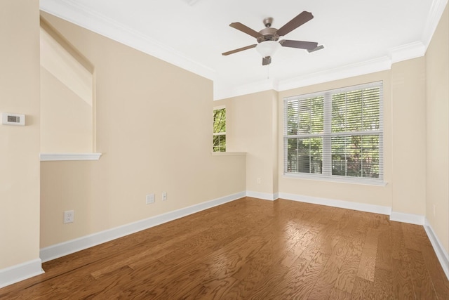 spare room with hardwood / wood-style flooring, ceiling fan, and ornamental molding