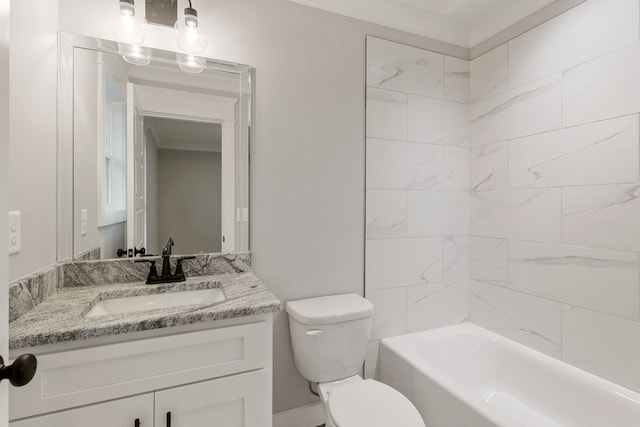 full bathroom featuring vanity, toilet, tiled shower / bath, and crown molding