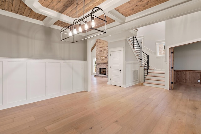 interior space featuring wood ceiling and a fireplace