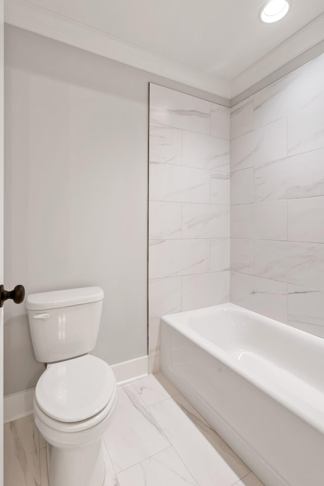 bathroom featuring toilet and crown molding