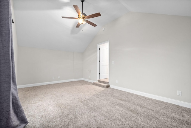 additional living space featuring carpet, ceiling fan, and lofted ceiling