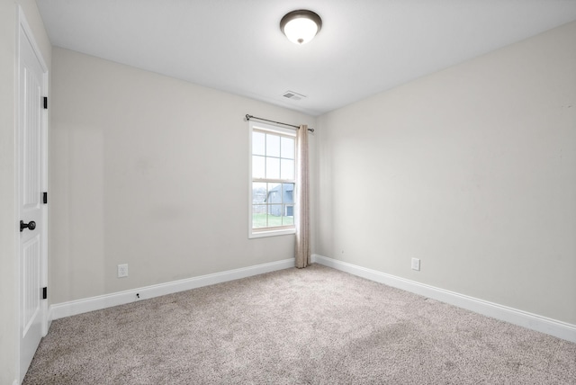 empty room with carpet flooring