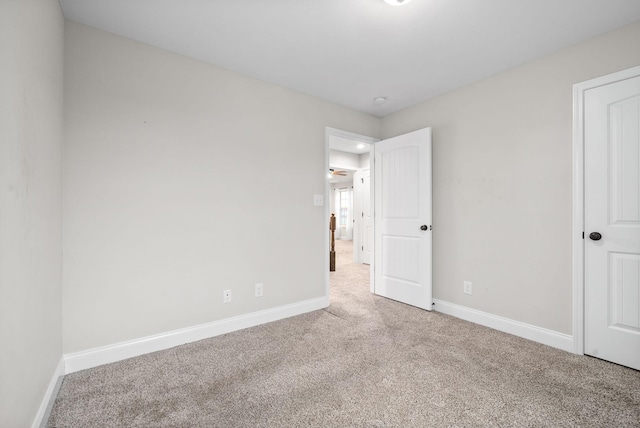 unfurnished bedroom featuring carpet