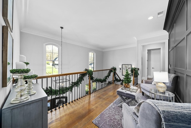 living room featuring dark hardwood / wood-style flooring and crown molding