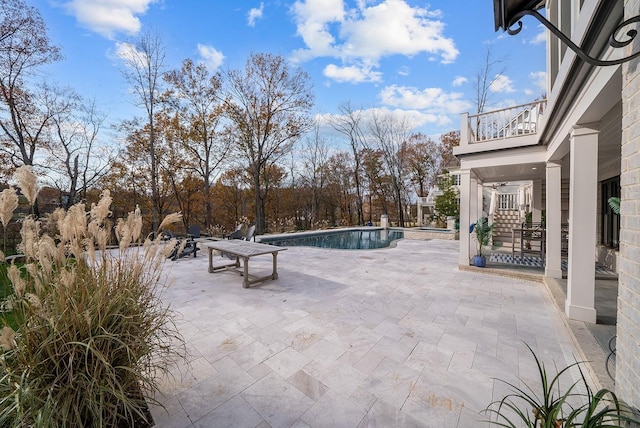 view of patio / terrace with a balcony