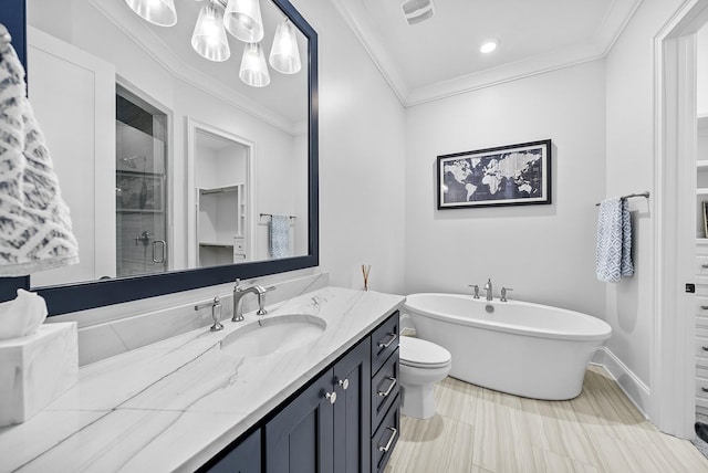 full bathroom featuring vanity, toilet, crown molding, and independent shower and bath