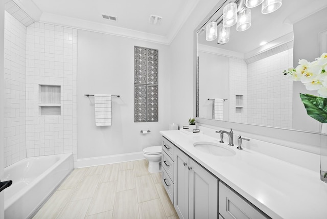 full bathroom with vanity, toilet, tiled shower / bath, and ornamental molding