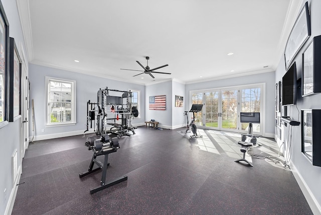 exercise room featuring ceiling fan and crown molding