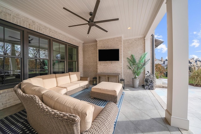 view of patio / terrace with an outdoor living space and ceiling fan