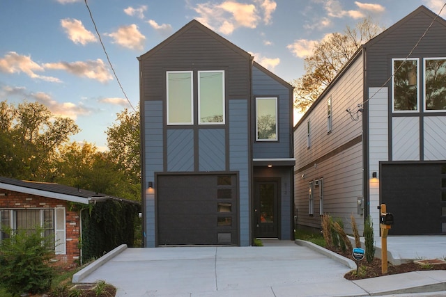 modern home featuring a garage