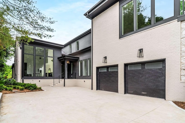 view of home's exterior with a garage