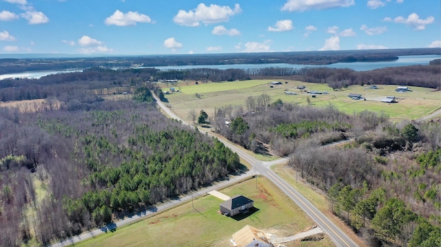 aerial view featuring a rural view and a water view