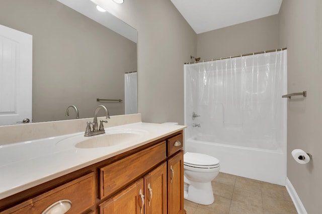 full bathroom featuring tile patterned flooring, vanity, toilet, and shower / bath combo with shower curtain