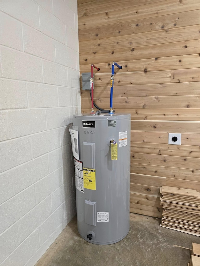 utility room with electric water heater