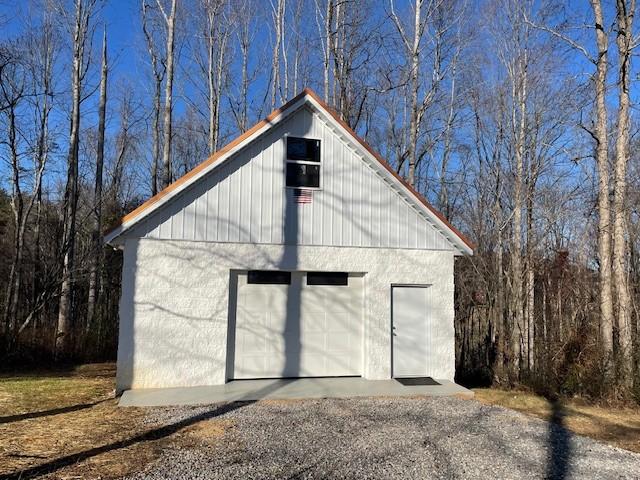 view of outbuilding with a garage