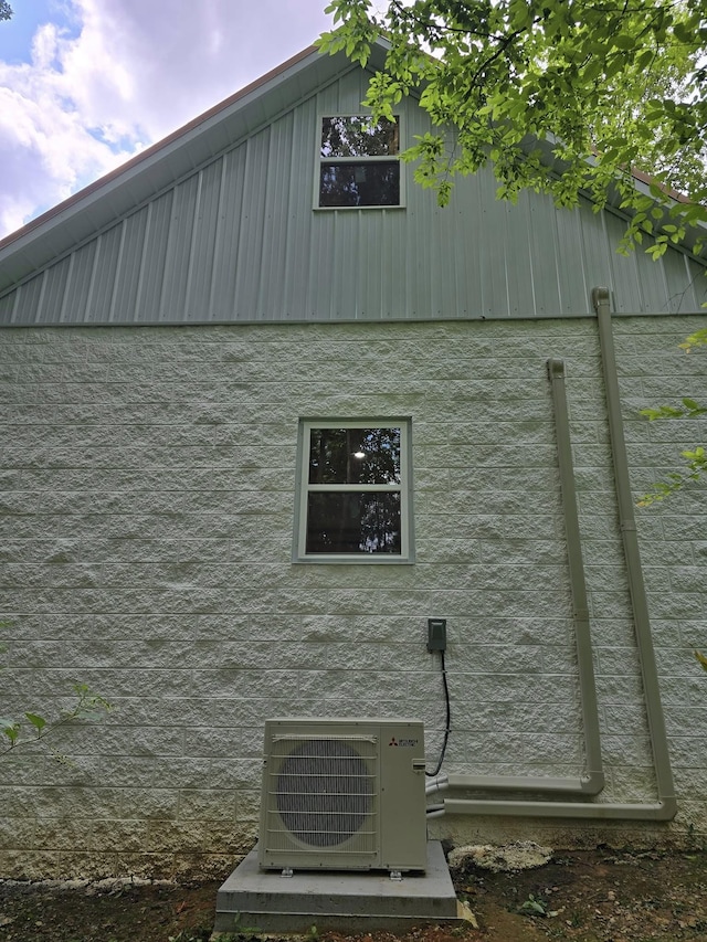 view of property exterior with ac unit