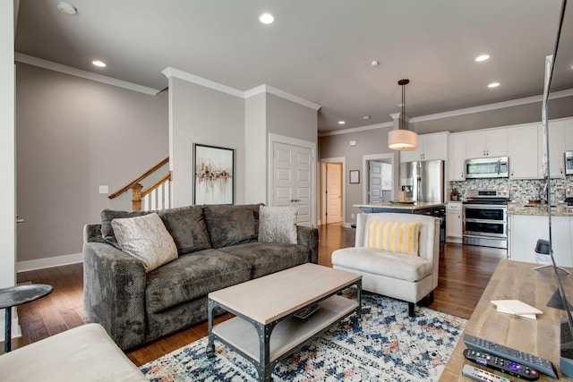 living room featuring crown molding and dark hardwood / wood-style floors