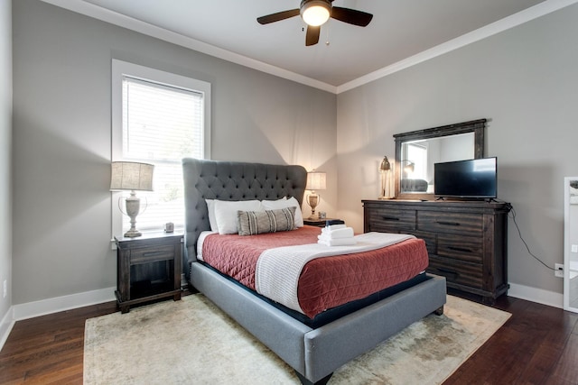 bedroom featuring hardwood / wood-style floors, ceiling fan, and crown molding