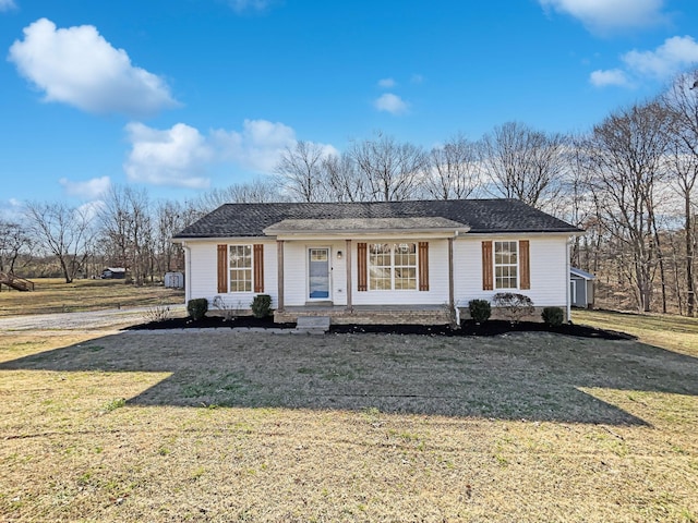 view of front of home with a front yard