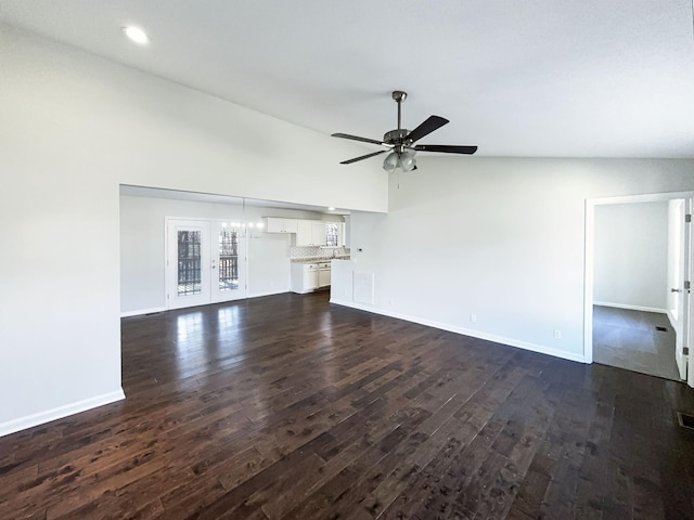 unfurnished living room with ceiling fan and dark wood-type flooring