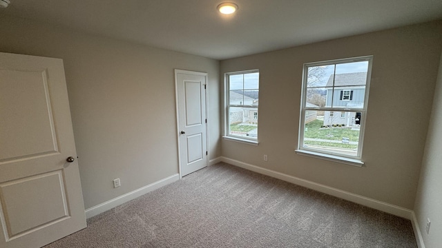 empty room with light carpet