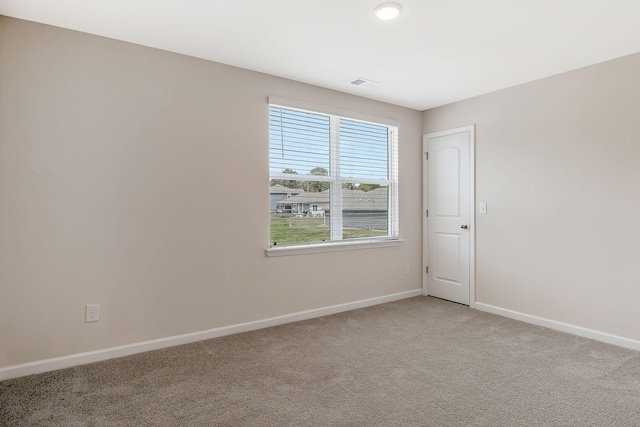 view of carpeted spare room