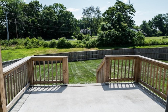 wooden terrace with a yard