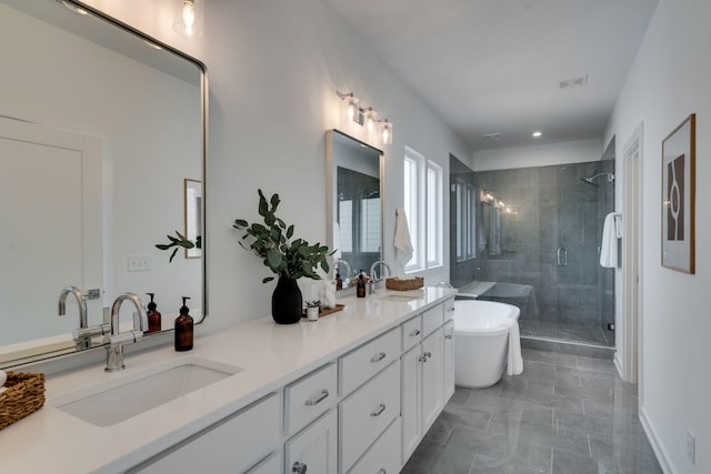 bathroom with vanity and separate shower and tub