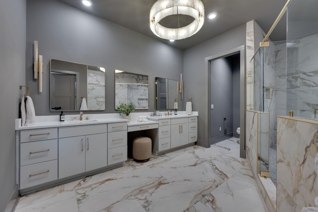 bathroom with toilet, vanity, and walk in shower