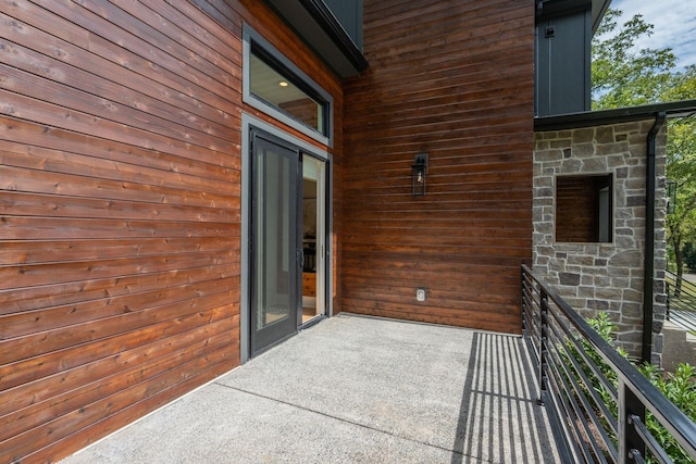 view of patio with a balcony