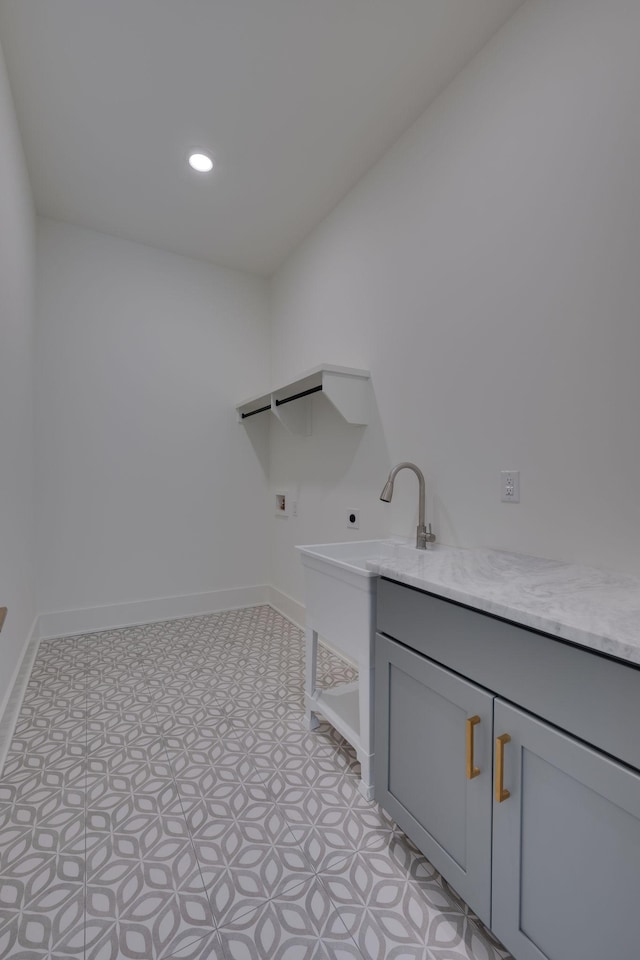 clothes washing area with hookup for an electric dryer and washer hookup