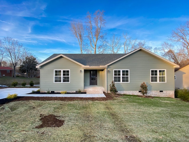 ranch-style house with a front lawn