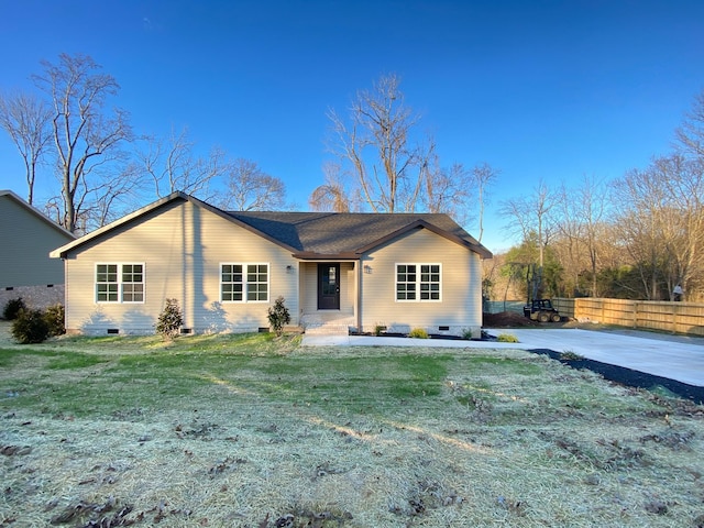 ranch-style house with a front yard