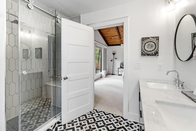 bathroom featuring vanity, walk in shower, lofted ceiling, and wood ceiling