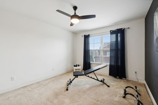 workout room featuring carpet floors and ceiling fan