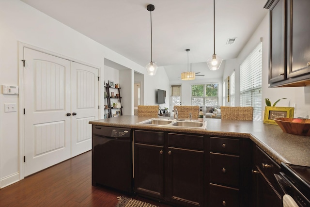 kitchen featuring dishwasher, stove, sink, hanging light fixtures, and dark brown cabinets