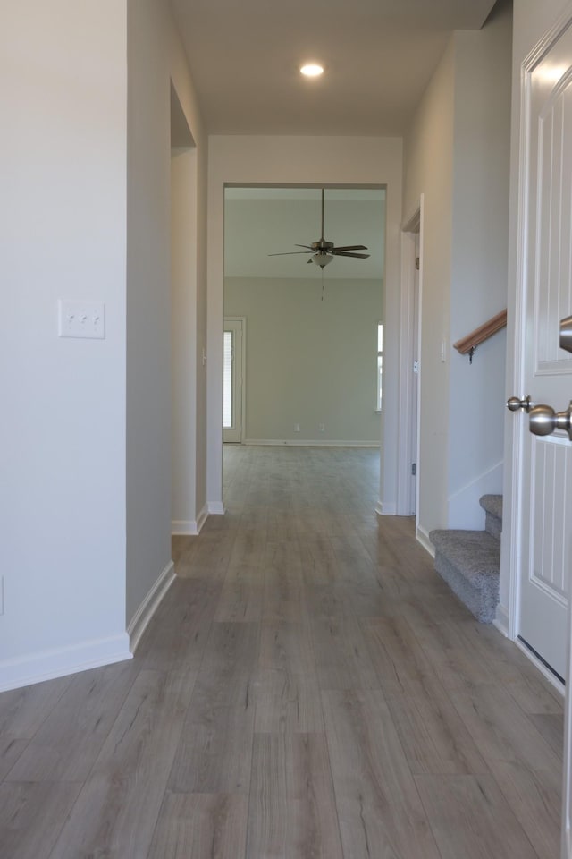 corridor featuring light hardwood / wood-style flooring