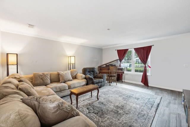 living room with ornamental molding and hardwood / wood-style flooring