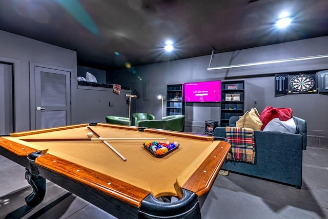 rec room with concrete floors and pool table