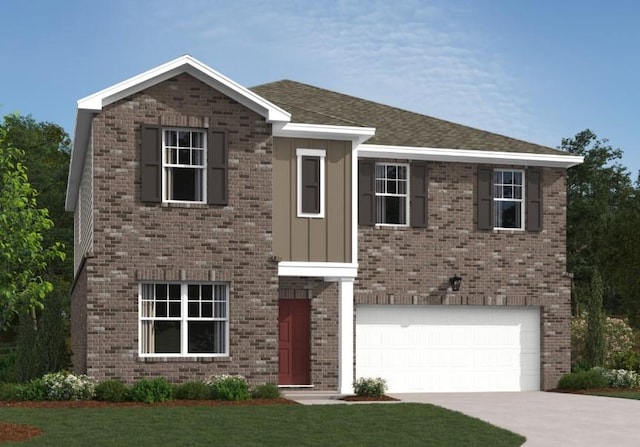 view of front of house with a front lawn and a garage