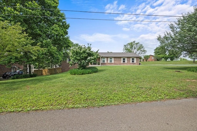 view of front of house with a front lawn