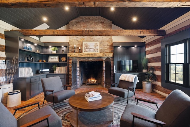 living room featuring a fireplace, wood ceiling, and lofted ceiling