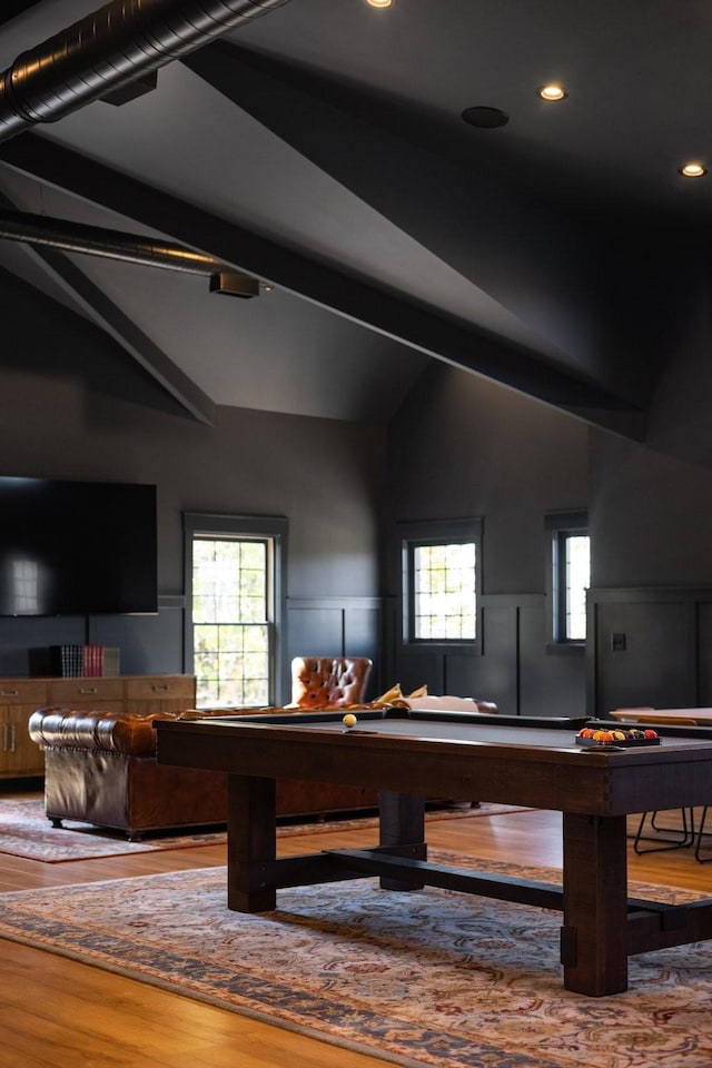 rec room featuring hardwood / wood-style floors, vaulted ceiling, and billiards