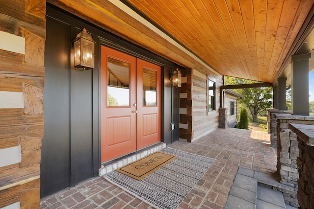 doorway to property with a porch