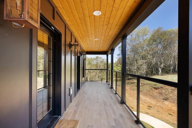 exterior space featuring a wealth of natural light and wood ceiling