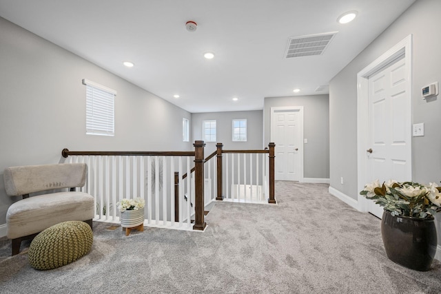 sitting room with light carpet