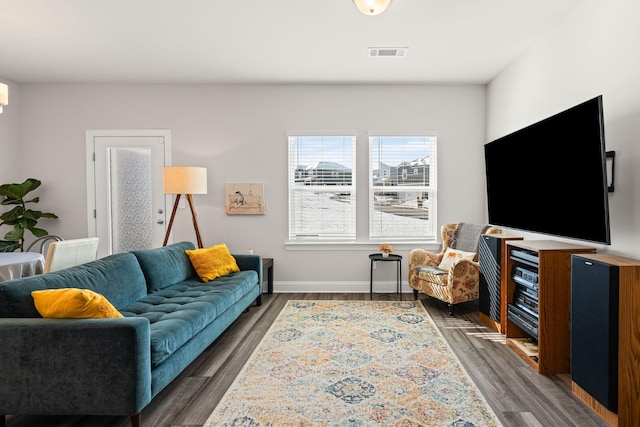 living room featuring dark hardwood / wood-style floors