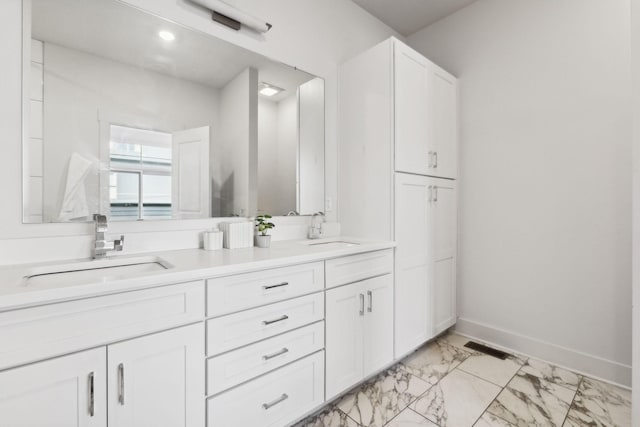 bathroom featuring vanity